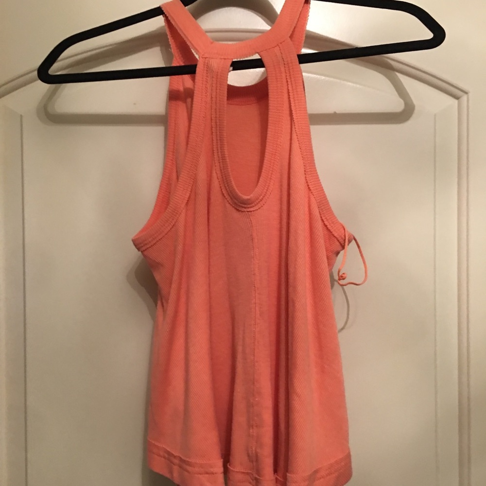 Free people orange flow top.